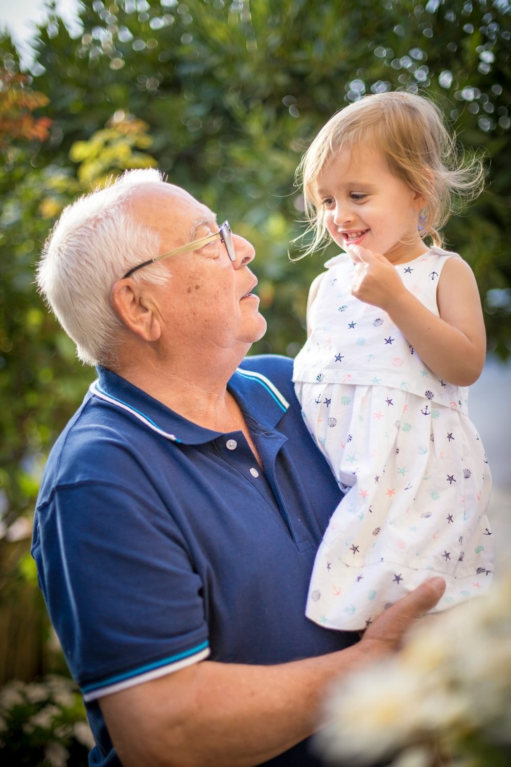 Grandmother with her child — tenderness at the threshold of life