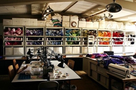 Textiles studio with colourful fabrics on shelves